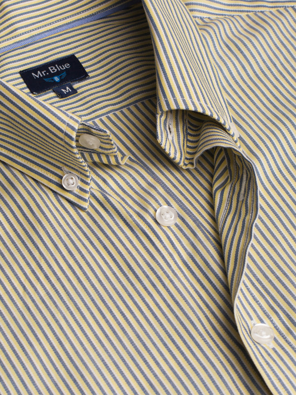 Camisa de algodón a rayas azul claro y amarillo con bolsillo