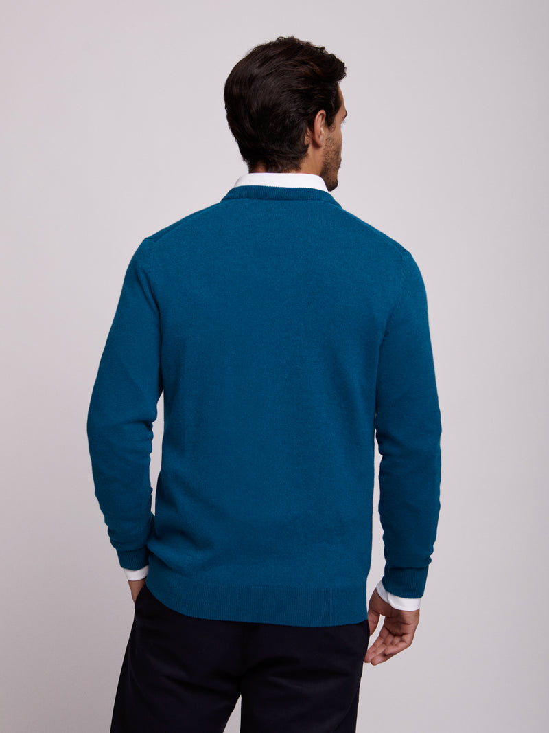 Jersey de lana azul con cuello en V